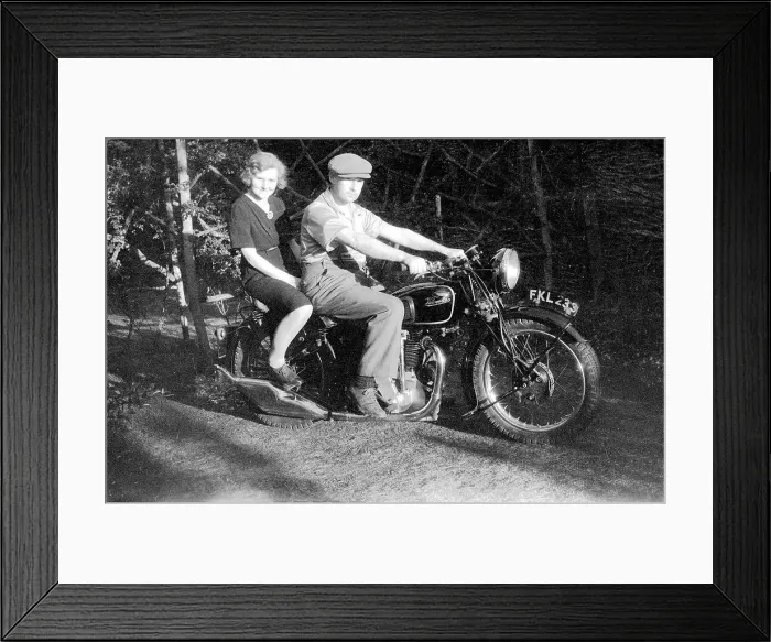Framed Print : Velocette motorcycle with couple Framed Print : Velocette motorcycle with couple