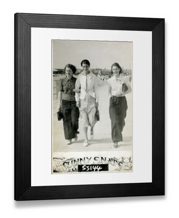Framed Print : Three young ladies strolling along the seafront Framed Print : Three young ladies strolling along the seafront