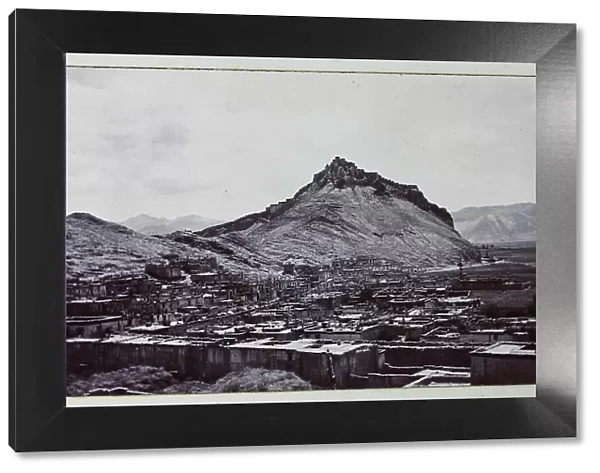 View of the town of Gyantse, with the Dzong (fortified monastery) at the top of the hill, from a fascinating album which reveals new details on a little-known campaign in which a British military force brushed aside Tibetan defences to capture