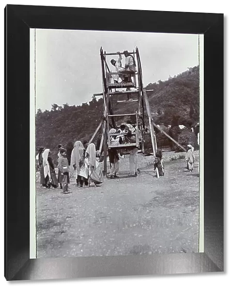 People on a wheel at Gangtok, Sikkim, India, from a fascinating album which reveals new details on a little-known campaign in which a British military force brushed aside Tibetan defences to capture Lhasa, in 1904