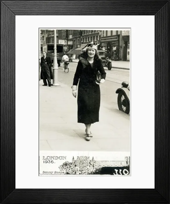 Framed Print : Middle aged woman in long fur-trimmed coat in Lewisham Framed Print : Middle aged woman in long fur-trimmed coat in Lewisham