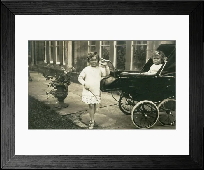 Framed Print : Two young children at Hampton Court Castle, Herefordshire Framed Print : Two young children at Hampton Court Castle, Herefordshire