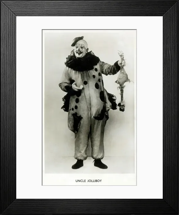 Framed Print : Clown Uncle Jolliboy - holding up a fake chicken Framed Print : Clown Uncle Jolliboy - holding up a fake chicken