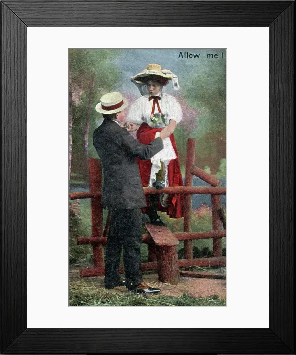 Framed Print : Courteous Gent assists a young lady climbing over a stile Framed Print : Courteous Gent assists a young lady climbing over a stile