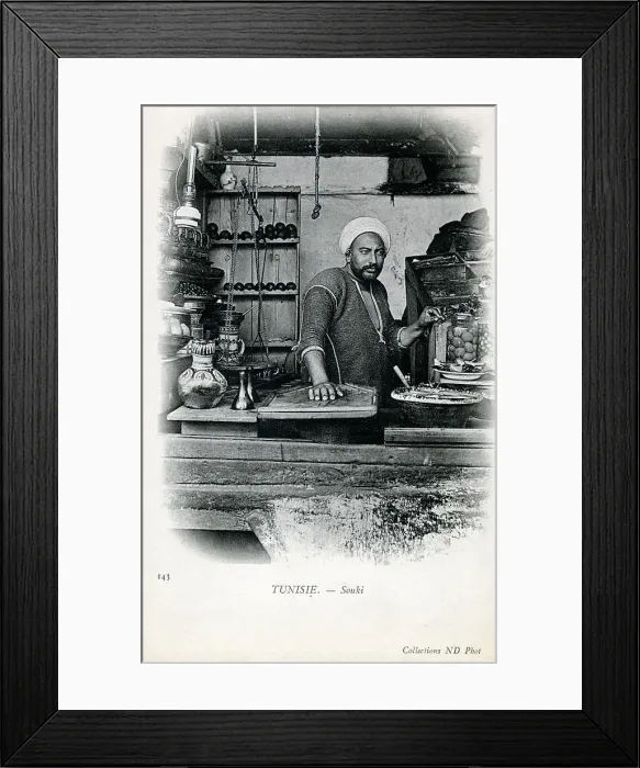 Framed Print : Tunisia - a trader in a shops in the medina of Tunis Framed Print : Tunisia - a trader in a shops in the medina of Tunis