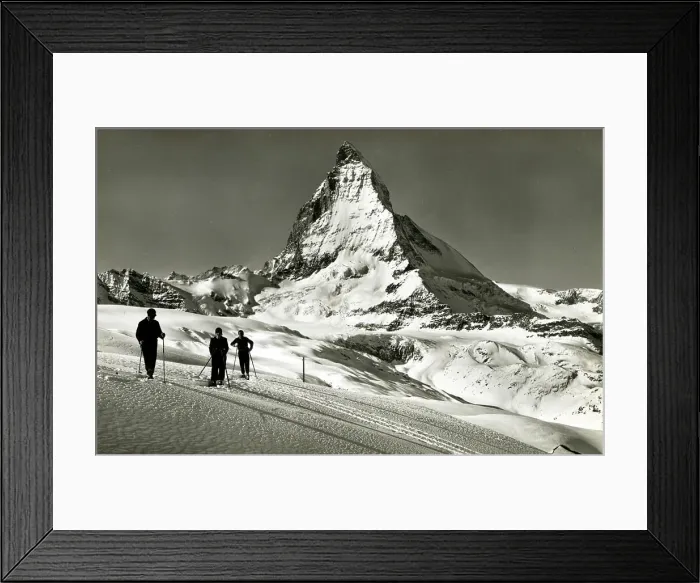 Framed Print : Skiers and the Matterhorn (Mont Cervin), Switzerland Framed Print : Skiers and the Matterhorn (Mont Cervin), Switzerland