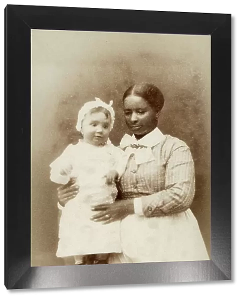 Little white toddler with her black nanny