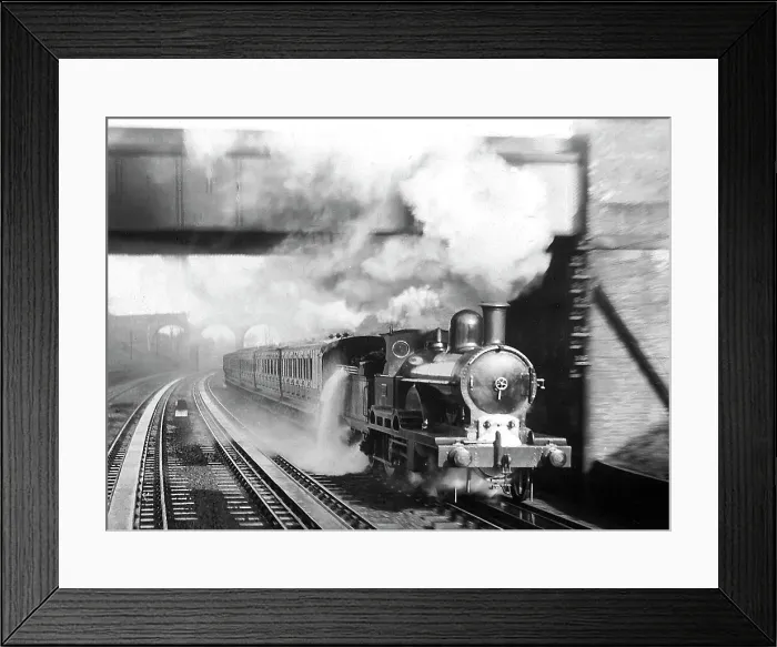 Framed Print : Bushey Steam Train picking up water early 1900s Framed Print : Bushey Steam Train picking up water early 1900s