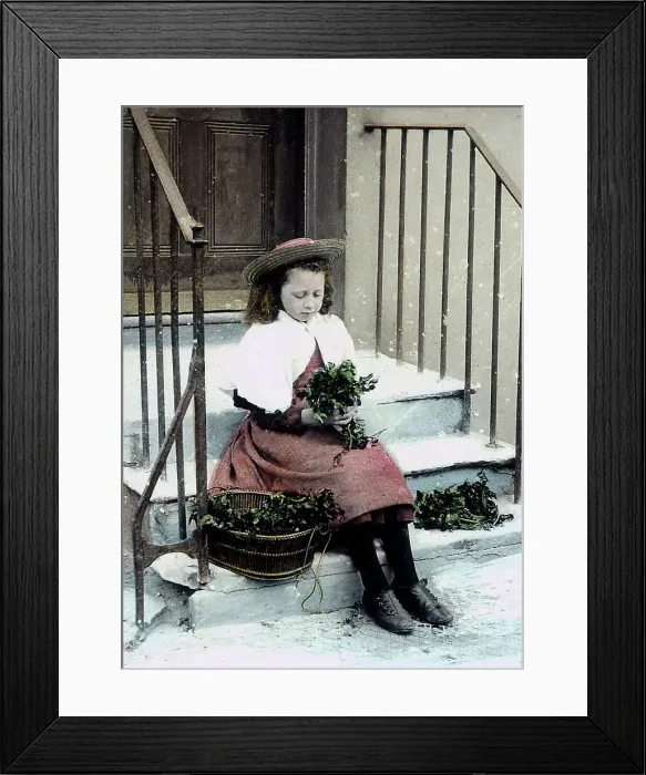 Framed Print : Girl with flower posy in the snow Framed Print : Girl with flower posy in the snow
