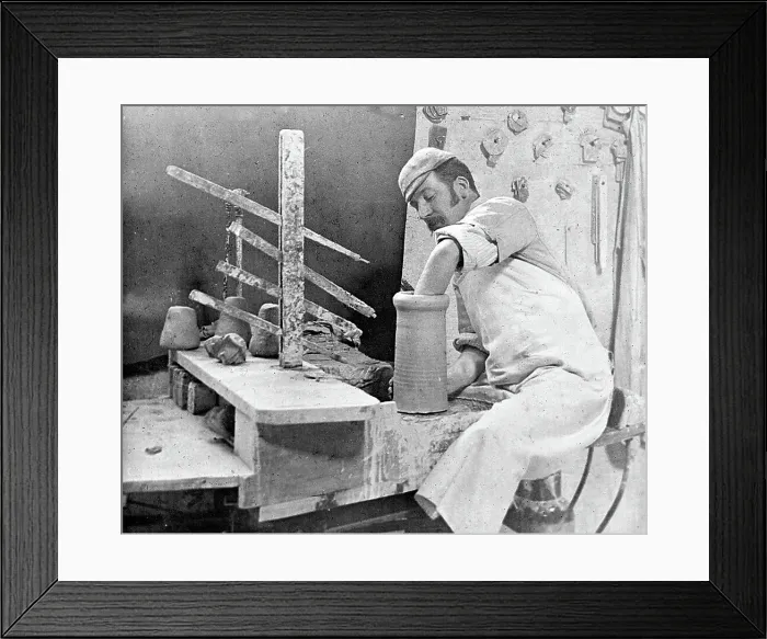 Framed Print : Throwing a pot on a wheel in a pottery factory Framed Print : Throwing a pot on a wheel in a pottery factory