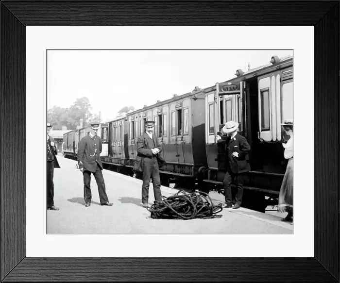Framed Print : Passengers and porters at an English railway station Framed Print : Passengers and porters at an English railway station