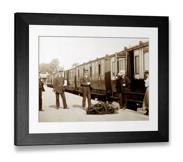Framed Print : Passengers and porters at an English railway station Framed Print : Passengers and porters at an English railway station