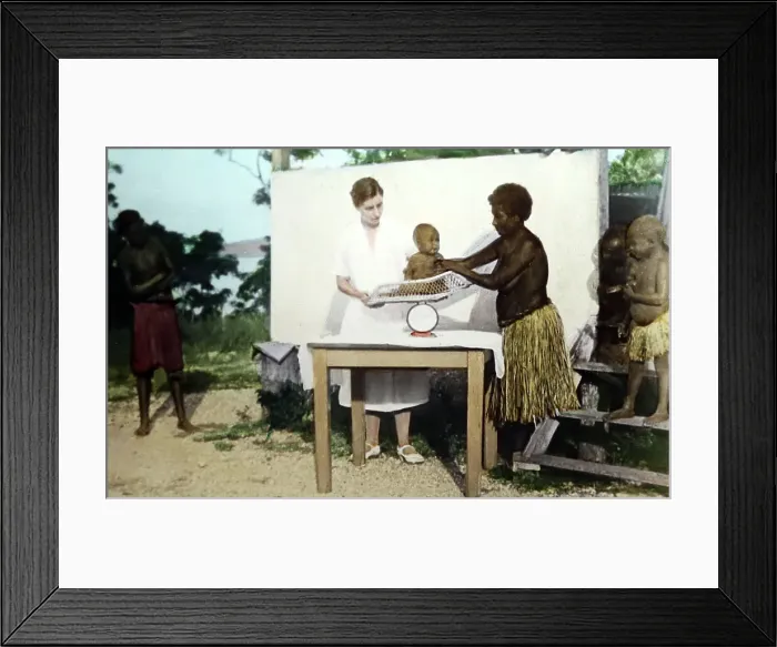 Framed Print : Nurse weighing a baby, Christian Missionary, Port Moresby Framed Print : Nurse weighing a baby, Christian Missionary, Port Moresby