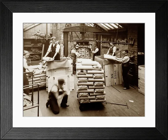 Framed Print : Packing finished cloth in a woollen mill in Bradford Framed Print : Packing finished cloth in a woollen mill in Bradford