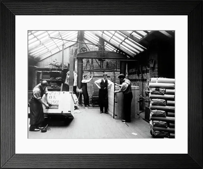 Framed Print : Packing finished cloth in a woollen mill in Bradford Framed Print : Packing finished cloth in a woollen mill in Bradford