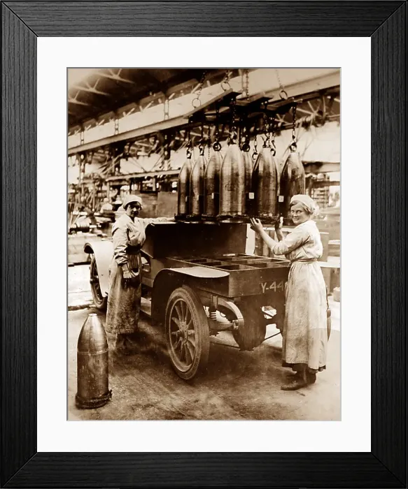 Framed Print : Loading shells onto a lorry in a munitions factory - WW1 Framed Print : Loading shells onto a lorry in a munitions factory - WW1