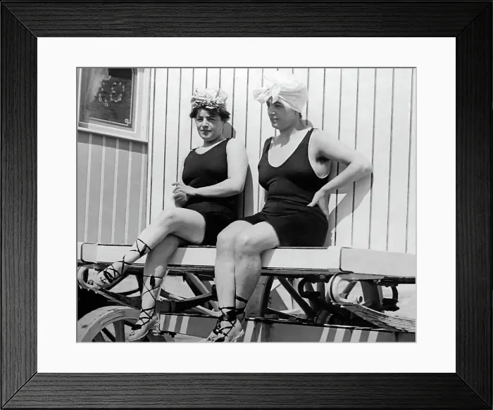Framed Print : Girls relaxing on a bathing machine, early 1900s Framed Print : Girls relaxing on a bathing machine, early 1900s
