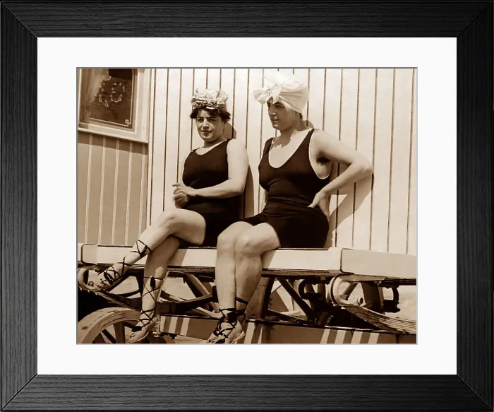 Framed Print : Girls relaxing on a bathing machine, early 1900s Framed Print : Girls relaxing on a bathing machine, early 1900s