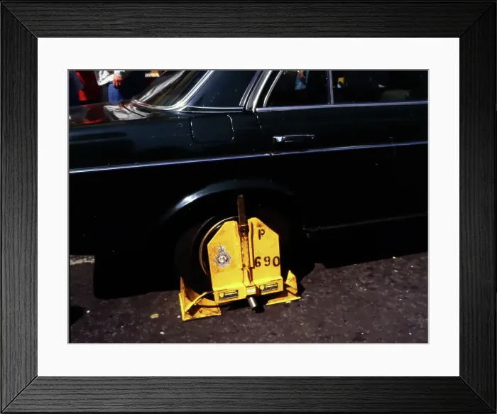Framed Print : Wheel clamp, London in the 1980s Framed Print : Wheel clamp, London in the 1980s