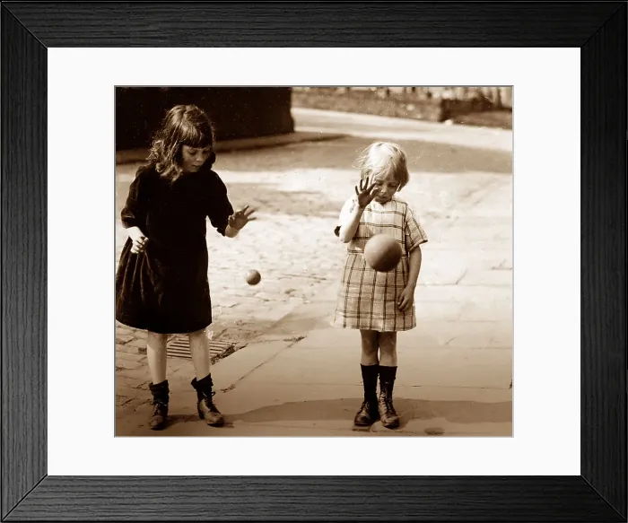 Framed Print : Children bouncing balls, early 1900s Framed Print : Children bouncing balls, early 1900s