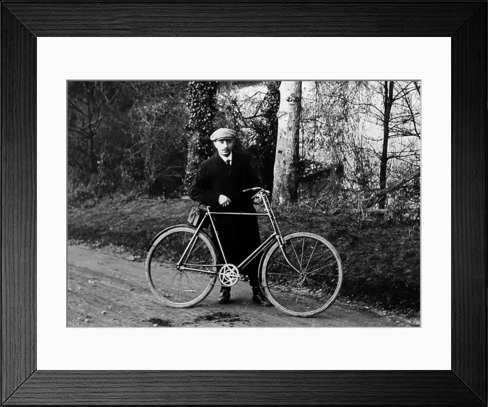 Framed Print : Proud cyclist with his bicycle, early 1900s Framed Print : Proud cyclist with his bicycle, early 1900s