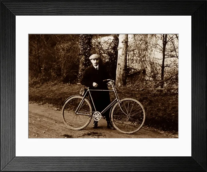 Framed Print : Proud cyclist with his bicycle, early 1900s Framed Print : Proud cyclist with his bicycle, early 1900s