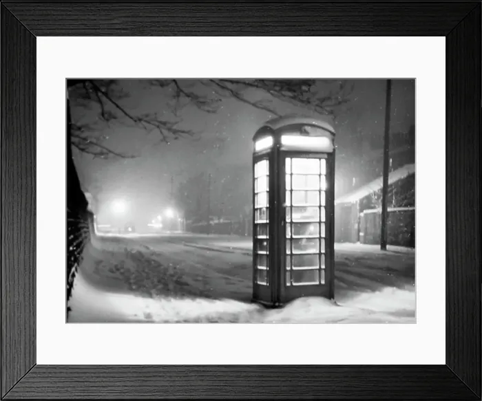 Framed Print : A telephone box in Winter in the 1940s Framed Print : A telephone box in Winter in the 1940s