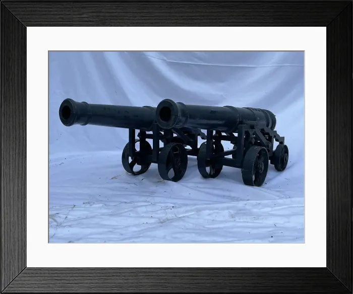 Framed Print : Pair of cast iron cannon on carriages