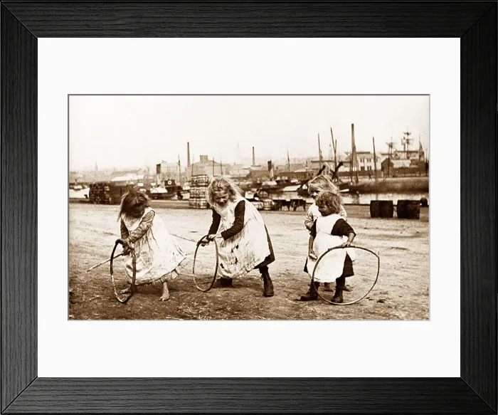 Framed Print : Children playing with stick and hoops Framed Print : Children playing with stick and hoops