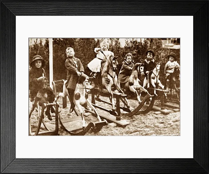 Framed Print : Children on Rocking Horses early 1900s Framed Print : Children on Rocking Horses early 1900s