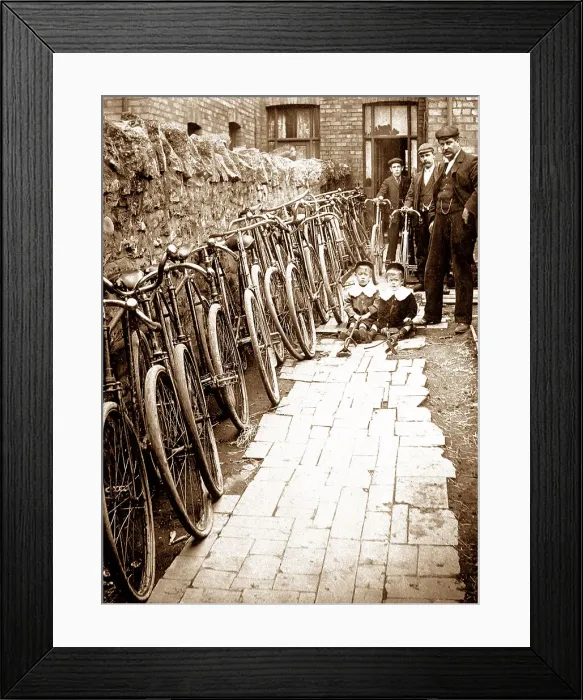 Framed Print : Bicycle dealer or repairer early 1900s Framed Print : Bicycle dealer or repairer early 1900s