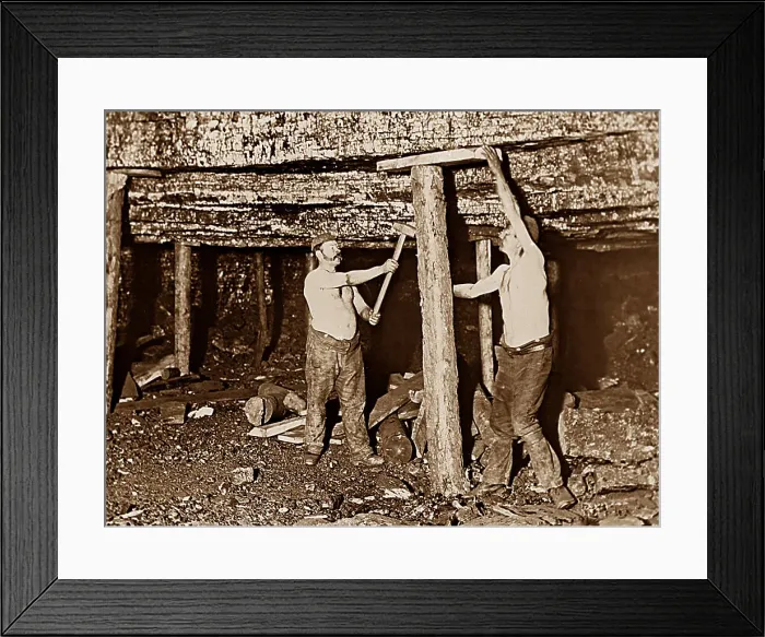 Framed Print : Coal Mining fitting roof supports early 1900s Framed Print : Coal Mining fitting roof supports early 1900s