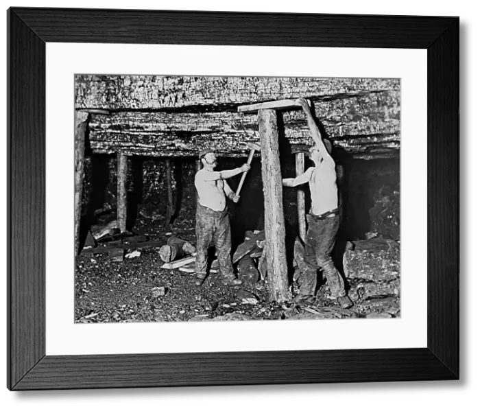 Framed Print : Fitting roof supports in a coal mine Framed Print : Fitting roof supports in a coal mine