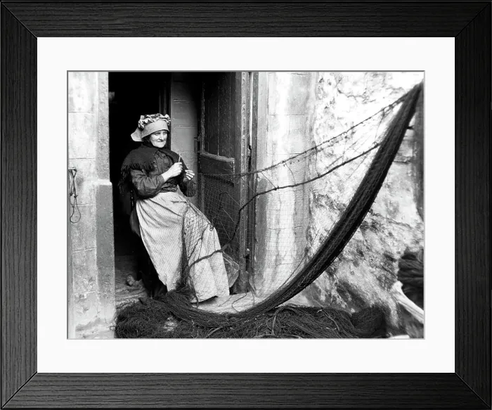 Framed Print : Mending fishing nets early 1900s Framed Print : Mending fishing nets early 1900s