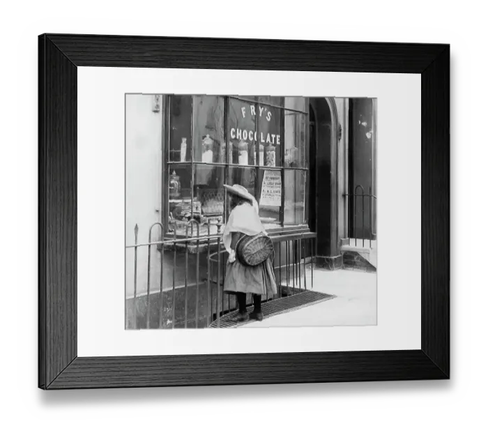 Framed Print : Girl looking in sweet shop window Victorian period Framed Print : Girl looking in sweet shop window Victorian period