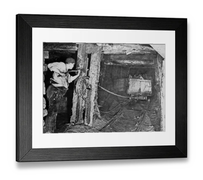 Framed Print : Coal miner using self-acting incline haulage early 1900s