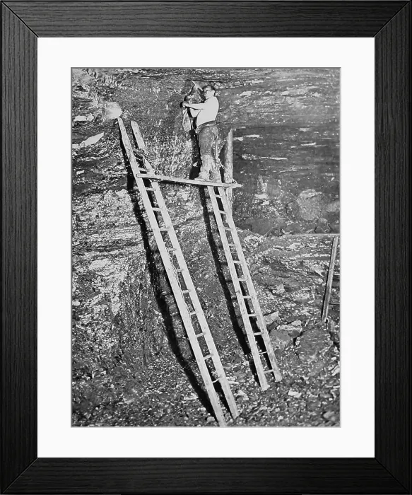 Framed Print : Miner working a high seam Victorian period Framed Print : Miner working a high seam Victorian period