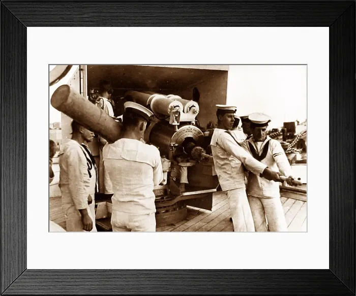 Framed Print : Royal Navy sailors ramming home a projectile probably 1930s Framed Print : Royal Navy sailors ramming home a projectile probably 1930s