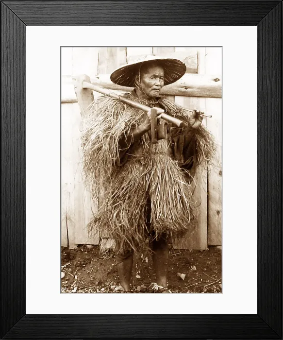 Framed Print : Japan - farmer wearing a raincoat early 1900s Framed Print : Japan - farmer wearing a raincoat early 1900s