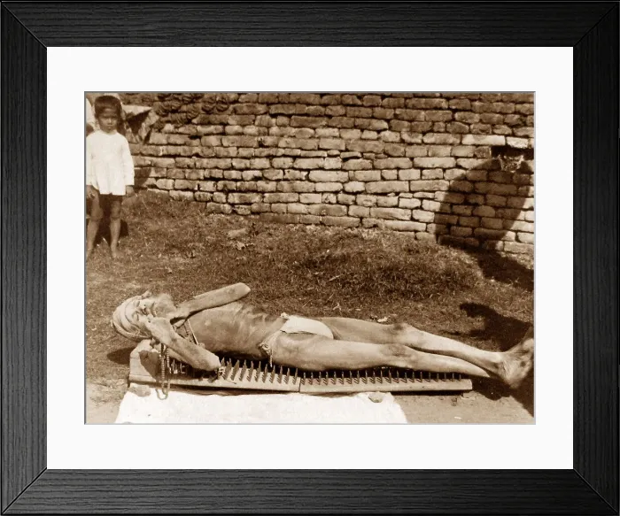 Framed Print : India - Calcutta - doing penance on a bed of spikes Framed Print : India - Calcutta - doing penance on a bed of spikes