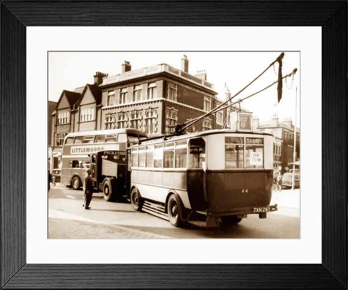 Framed Print : Ipswich trolley bus and Pickfords tow truck, possibly 1950s Framed Print : Ipswich trolley bus and Pickfords tow truck, possibly 1950s
