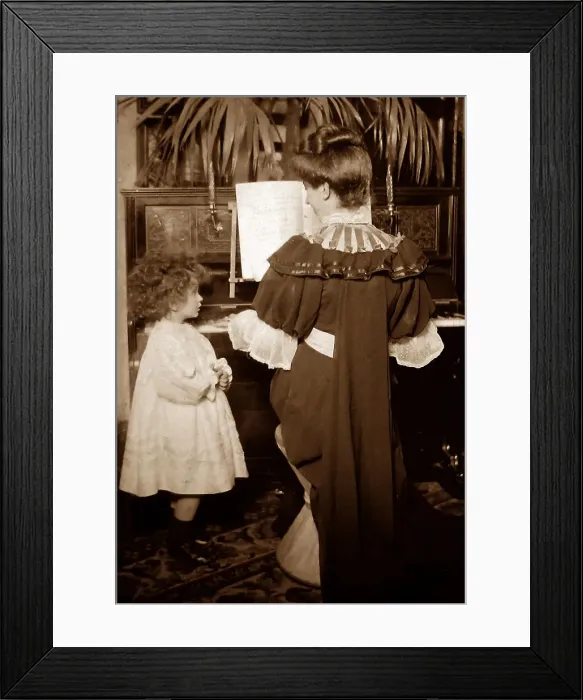 Framed Print : Playing the piano in an Edwardian parlour - early 1900s Framed Print : Playing the piano in an Edwardian parlour - early 1900s