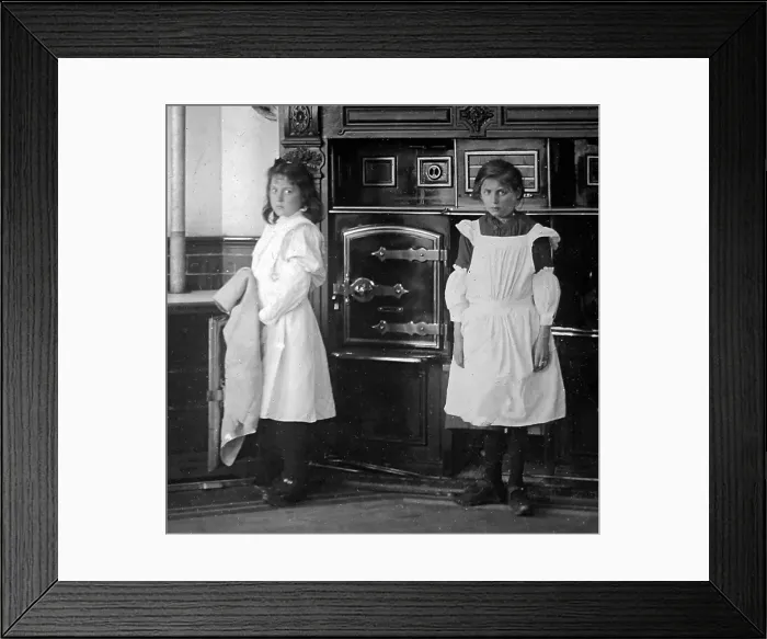 Framed Print : Domestic servants in a kitchen Framed Print : Domestic servants in a kitchen