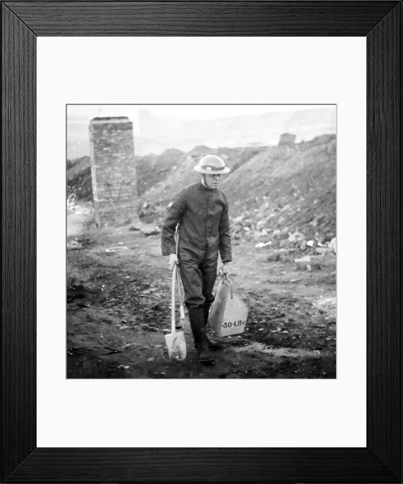 Framed Print : Removing an unexploded incendiary bomb, ARP training Framed Print : Removing an unexploded incendiary bomb, ARP training