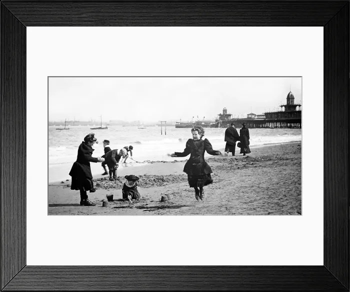 Framed Print : Girl skipping, New Brighton beach and pier Framed Print : Girl skipping, New Brighton beach and pier