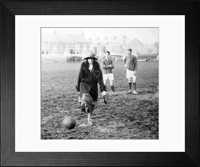 Framed Print : Woman playing football Framed Print : Woman playing football