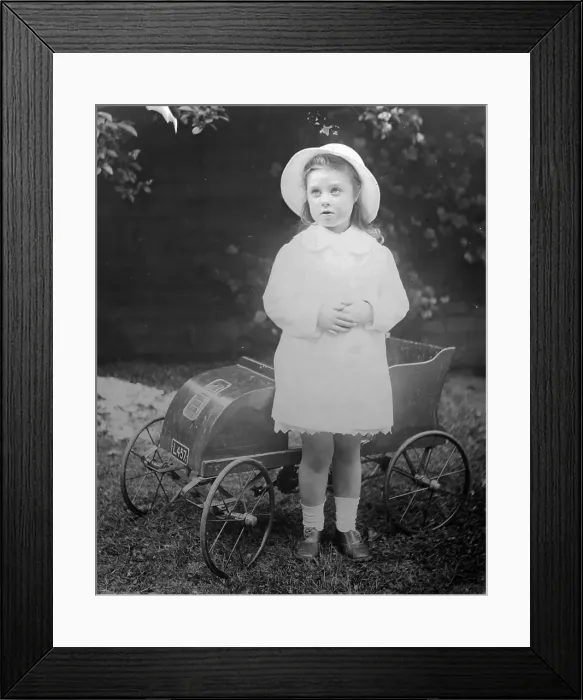 Framed Print : Girl with pedal car Framed Print : Girl with pedal car