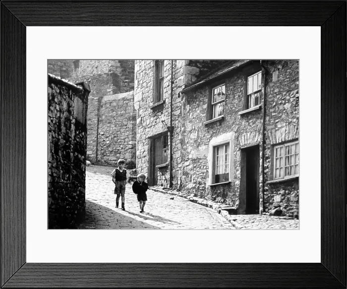 Framed Print : A street in Kendal, Cumbria in the 1930s Framed Print : A street in Kendal, Cumbria in the 1930s