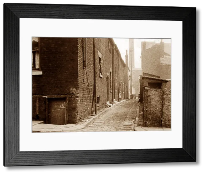 Framed Print : Slum housing, probably Manchester, early 1900s Framed Print : Slum housing, probably Manchester, early 1900s