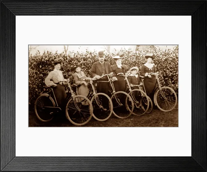 Framed Print : An Edwardian family with their bicycles, early 1900s Framed Print : An Edwardian family with their bicycles, early 1900s